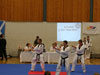 Lisburn's Peter Stewart 4th Dan, UTA-NI Head, Queen's instrustor Glen Culbert 6th Dan, Rosetta TKD's Damian Duffy 4th Dan